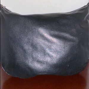 Gently used Tignanello black leather handbag